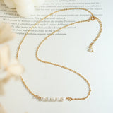 Fleur Perlenhalskette in Gold