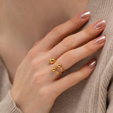 Plutos Umlaufbahn Ring in Gold